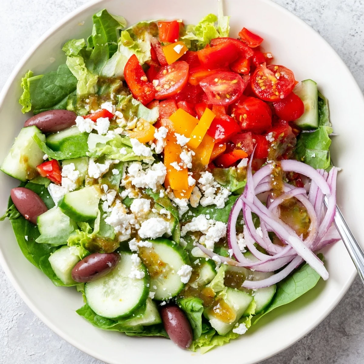 Bright bowl of mixed greens in this Fresh Salad Recipe, tossed and chilled.